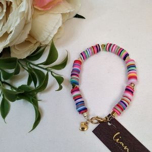 Multicolor plastic ring bracelet. Extra size brace